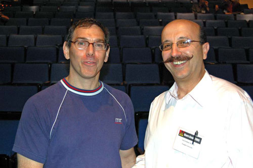 Ron Gilman (left), Rutgers University, completed his term as chairman of Jefferson Lab's Users Group Board at the end of the Annual Users Group Meeting and Workshop held in June. Incoming Chair Zein-Eddine Meziani, Temple University, now leads the Users Group Board of Directors.