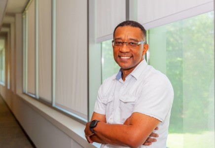 Ron Lassiter near building windows
