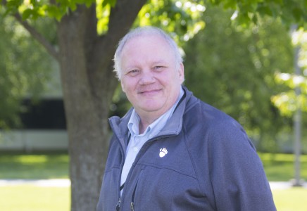 Jim Follkie portrait outside on JLab campus