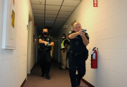 Two NNPD officers approach