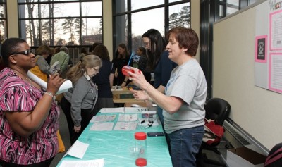 Teachers discuss an activity at Teacher Night 2018