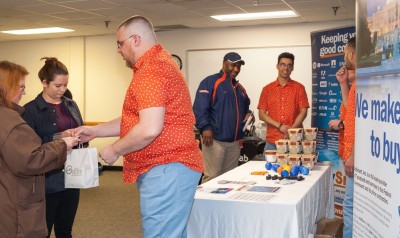 Photo of lab staff interacting with a vendor at the Vendor Fair 2018