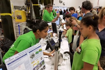 Members of the JLab community interact with the public at the Open House in 2018- SRF Institute